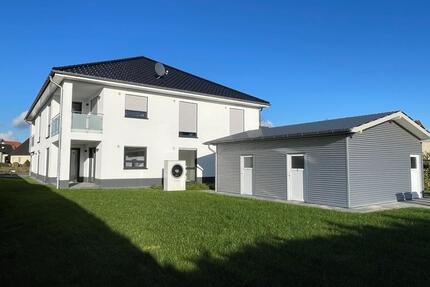 Moderne 3-Zimmer-Wohnung mit Balkon – ca. 100 m², Einbauküche & 2 Stellplätze | Melle-Bruchmühlen