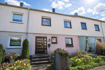 Ihr neues Zuhause: Reihenmittelhaus mit Garten und Garage in Wörth am Rhein