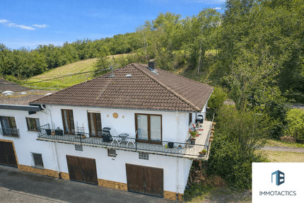 Einfamilienhaus mit umlaufendem Balkon und zwei großen Maxi-Garagen und Weitblick in Guldental