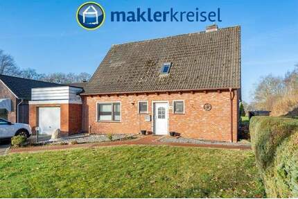 Einfamilienhaus mit Garage und großem Grundstück in Ardorf - Wittmund OT Ardorf
