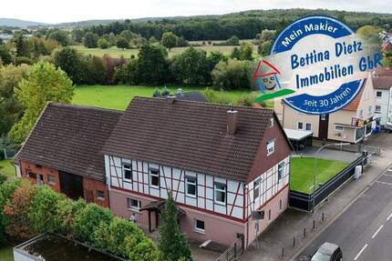 DIETZ: Geräumiges 1-2 Familienhaus mit großem Grundstück, Nebengebäude und Doppelgarage! - Hasselroth / Neuenhaßlau