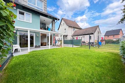 Modern. Offen. Geborgen. Neuwertige 2-Zimmer-Erdgeschosswohnung mit Terrasse & Garten in Niederkassel