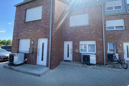 Nachhaltiges Wohnen in Ochtrup–modernes Reihenhaus mit Wärmepumpe