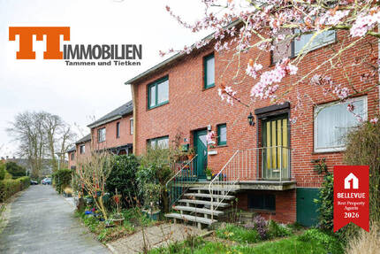 TT bietet an: Charmantes Reihenmittelhaus mit hübscher Hochterrasse in ruhiger Lage von Wilhelmshaven-Neuengroden!