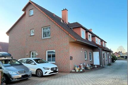 Reihenmittelhaus mit Sonnenterrasse und Balkon in Schortens