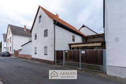 Haus zum Kaufen in Kleinostheim 150.000,00 € 110 m²