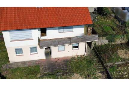 Signature Living: Einfamilienhaus in unverbaubarer Aussichtslage mit Potenzial! - Leonberg