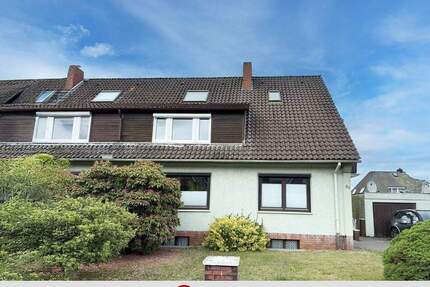 Haushälfte mit zwei vermieteten Wohneinheiten und großem Grundstück! - Achim Baden