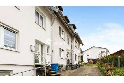 Vielseitiges Reihenmittelhaus mit Einliegerwohnung, Kamin und sonnigem Garten - Ochsenhausen Hattenburg