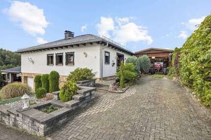Haus zum Kaufen in Aßlar-Oberlemp 272.000,00 € 133.86 m²