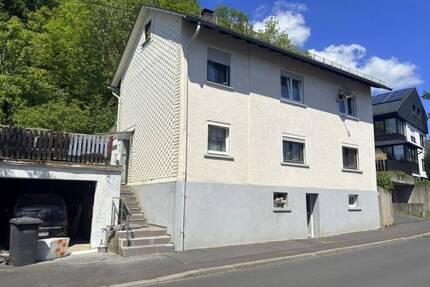 Gemütliches Einfamilienhaus mit kleinem Garten, Terrasse und Garage in zentraler Lage von Westerburg
