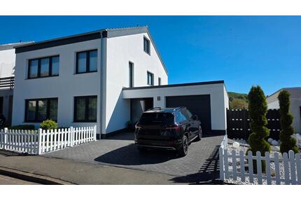 Einfamilienhaus mit Garage und schönem Garten - Bad Gandersheim