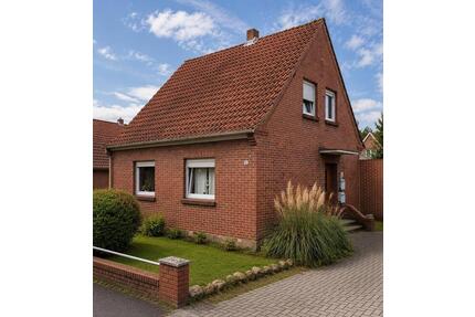 Charmantes Zweifamilienhaus mit Garten und 2 Garagen - Bramsche