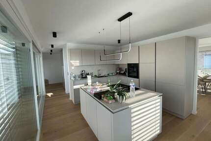 Wohnung zum Kaufen in Kirchheim 895.000,00 € 147.62 m²
