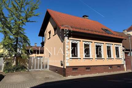 Haus zum Kaufen in Oberhausen-Rheinhausen 370.000,00 € 159 m²