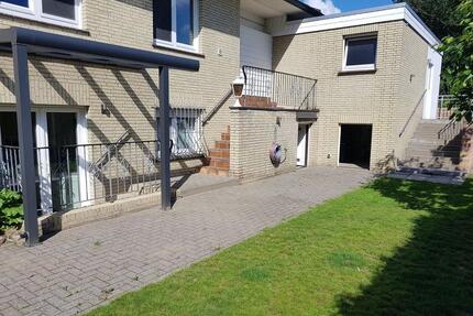 Begehrte Wohnlage! Hochwertige Souterrain-Wohnung mit Garten, EBK - Damme