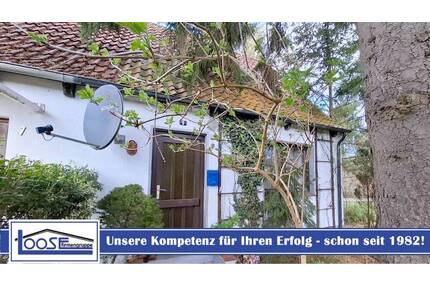 Doppelhaushälfte auf einem Erbbaugrundstück im Dornröschenschlaf in Bad Malente.