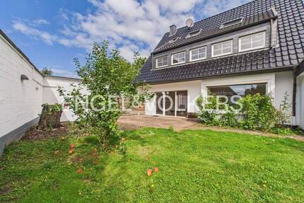 Helle Gartenwohnung mit Kamin, Doppelgarage nahe dem Krefelder Stadtwald