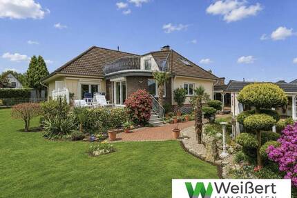 Zwischen Gartenidylle und Wohnkomfort - Großzügiges Ein-Zweifamilienhaus auf 1.176 m² Traumgrundstück - Hohenlockstedt
