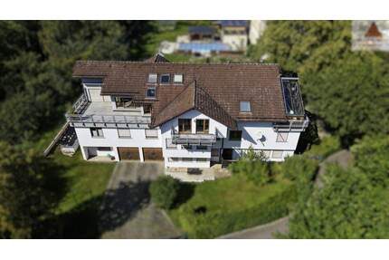 Penthouse-Style 235 m² Wohnung mit Dachterrasse & vermieteten Gewerbeeinheiten: LichtensteinZwickau - Lichtenstein/Sachsen