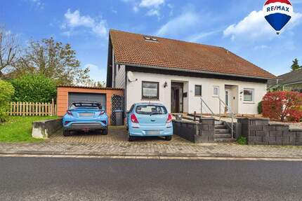 Charmante Doppelhaushälfte mit Wintergarten und Gartenparadies - Losheim am See / Niederlosheim