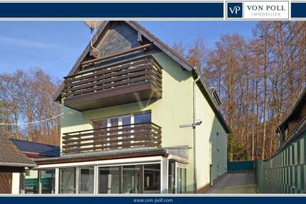 Zweifamilienhaus mit Einliegerwohnung - großer Garten und 3 Garagen - Langenfeld Immigrath