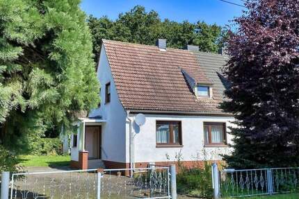 Doppelhaushälfte mit Charme und Entwicklungsmöglichkeiten - Mertendorf