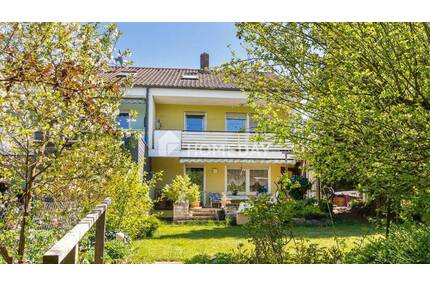 Gartenidylle trifft Wohnkomfort: Familienfreundliches Reihenhaus mit 6 Zimmern in Regensburg