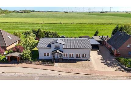 Einfamilienhaus mit Wiesenblick in Neuenkirchen - modern, effizient, vielseitig