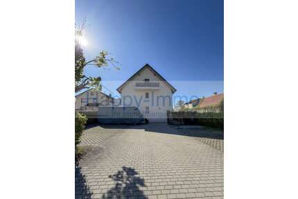 Haus zum Kaufen in Hallbergmoos 1.100.000,00 € 297 m²