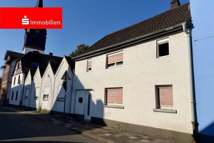 Wohnbaugrundstück mit Baugenehmigung in zentraler Lage! - Altbestand vermietet! - Mühlheim