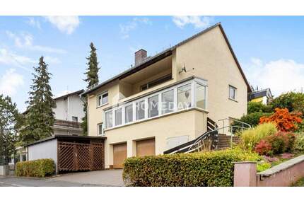 Familienidylle im Grünen - vielseitiges Zweifamilienhaus mit Ausbaureserve - Taunusstein-Seitzenhahn