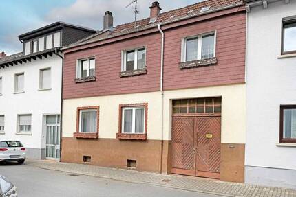 Einfamilienhaus in zentraler Lage von Oftersheim - Kernsanierung oder Neubau, Sie entscheiden!