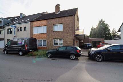 Einfamilienhaus mit großem Grundstück und zusätzlichem sanierungsbedürftigen Wohngebäude - Grevenbroich Noithausen