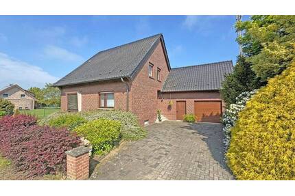 Gepflegtes Einfamilienhaus mit großem Grundstück und möglicher Neubauperspektive in Voerde-Stockum!