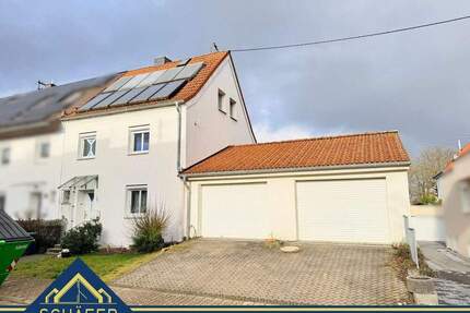 Doppelhaushälfte in Saarlouis-Vogelsang mit Doppelgarage und schönem Grundstück zu verkaufen