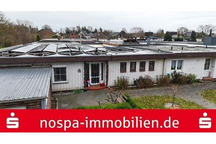 Modernisierter Bungalow mit Süd-Terrasse, Garage und Einliegerwohnung im Anbau in Flensburg-Weiche