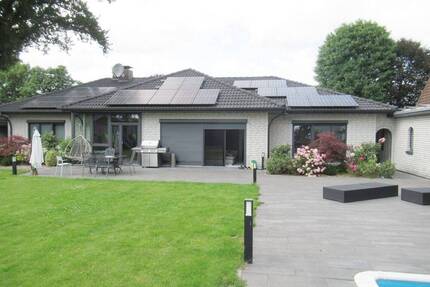 Stuhr energetisch sanierter Walmdachbungalow m. großen Garten und gr. Pool