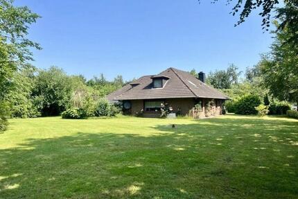 Freistehender Bungalow auf großem Grundstück zu verkaufen - Mildstedt