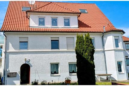3Wohneinheiten, ausgebautem Dachgeschoss und 2 Garagen in Aspach