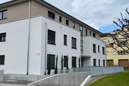 Modernes Wohnen mit eigenem Garten - barrierefreie Erdgeschosswohnung mit Terrasse, Tiefgarage & Keller - Wehr