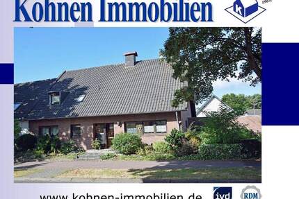 Hier ist Platz für die ganze Familie: Wohnhaus mit Einliegerwohnung und Bauland in 41379 Brüggen