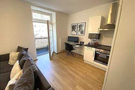 Frei ab sofort 2 - Zimmer-Wohnung im 1. Obergeschoss mit Aufzug Einbauküche Balkon - Bitburg