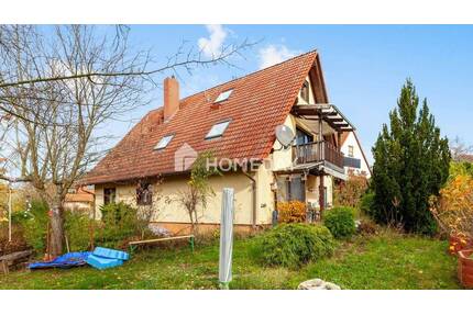 Ruhig gelegenes Mehrfamilienhaus mit 3 WE, Gartenidylle und attraktivem Entwicklungspotenzial - Puschendorf