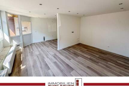 Kernsanierte 2-Zimmer-Erdgeschosswohnung mit überdachter Terrasse in Bahnhofsnähe von Palenberg - Übach-Palenberg / Palenberg