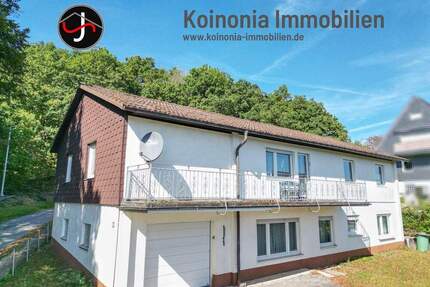 Familienfreundliches Einfamilienhaus mit Einliegerwohnung in Freudenberg - Oberholzklau