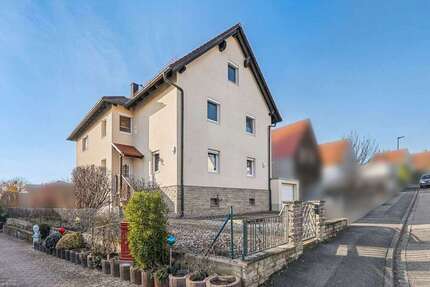 Haus zum Kaufen in Waldbüttelbrunn 649.000,00 € 245 m²