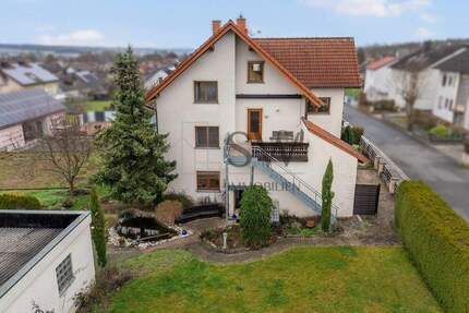 Großzügiges Einfamilienhaus mit getrenntem Baugrundstück - Wohnen & Investieren in Burgebrach