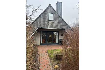 Familienglück hinter dem Deich – Ihr Wohlfühl-Ferienhaus mit Kamin & Garten - Wurster Nordseeküste Neufeld