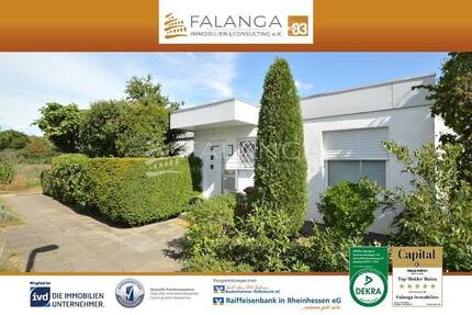 FALANGA IMMOBILIEN-Begehrter großer Bungalow in prima Zustand und top Grünlage in Mörfelden-Walldorf - Mörfelden-Walldorf / Walldorf